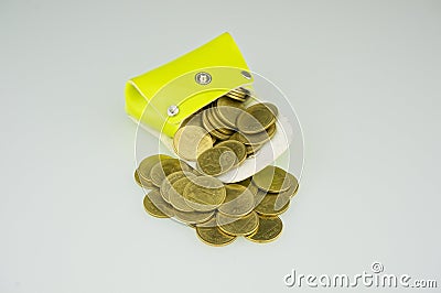 Light green pocket has gold coin gush Stock Photo