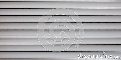 Light grey plastic texture metallic roller shutter door gray panels background Stock Photo