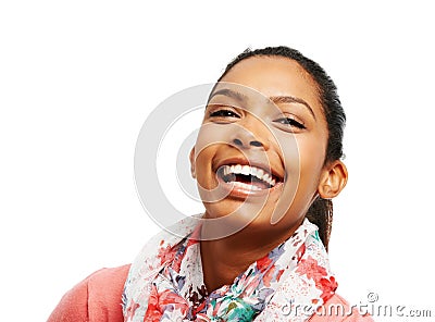 Light hearted lady. Close up of a laughing young woman against a white background. Stock Photo