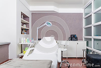 Light interior of a modern cosmetology room in a beauty salon. Stock Photo