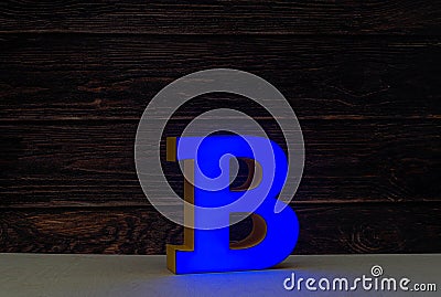 The light letter B is part of an advertising sign. Stock Photo