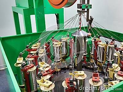 Light lever-arm braiding machines Stock Photo