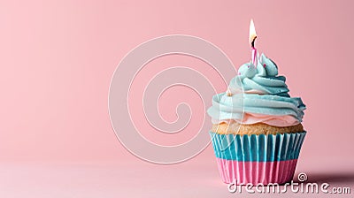 Light pink and light blue cupcake with one candle Stock Photo