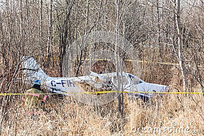 Light plane crash near highway Editorial Stock Photo