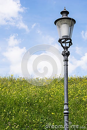 Light post on a field near Winterthur Switzerland Stock Photo