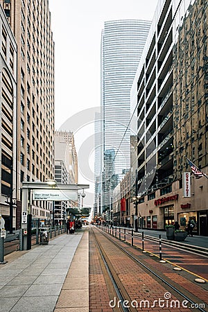 Light rail tracks and modern buildings at Main Street Square, in downtown Houston, Texas Editorial Stock Photo