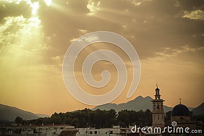 Light rays over the church Stock Photo