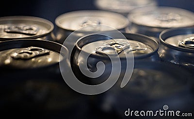 Light refreshments. Aluminum beverage cans. Drink cans. Pull tabs on cans tops. Metal containers designed for packaging Stock Photo