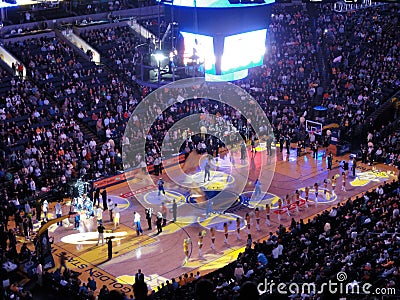 Light show goes on during Golden State Warriors intro to game as Editorial Stock Photo