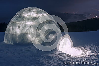 Light in snow igloo Stock Photo