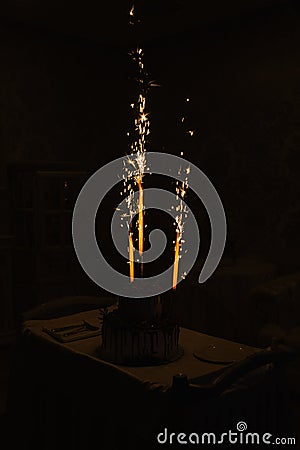 Sparks from the sparklers fountains wedding cake Stock Photo