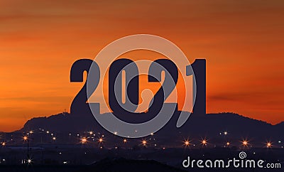 Light of Sunrise and number of two thousand twenty one on the Mountain peak Stock Photo