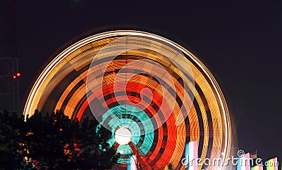 Light trail of Ferry wheel Stock Photo