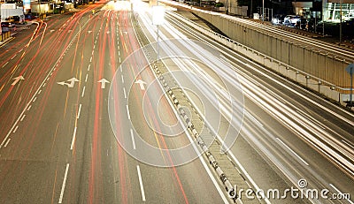 Light trails from a busy street in a city. Stock Photo