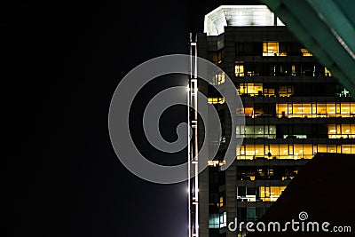 The light trails on the modern building background Stock Photo
