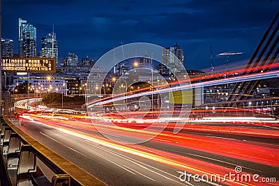 Light trails from vehicles on ANZAC Bridge in Sydney Editorial Stock Photo