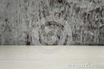 Light wooden desk on a gray background with a place for text Stock Photo