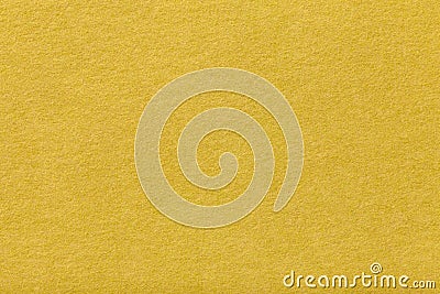 Light yellow matt suede fabric closeup. Velvet texture of felt. Stock Photo