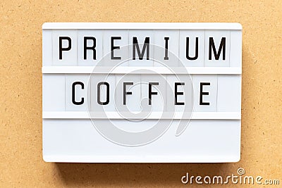 Light box with word premium coffee on wood background Stock Photo