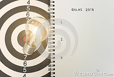 Lightbulb on dartboard. concept goal 2018 for new ideas Stock Photo