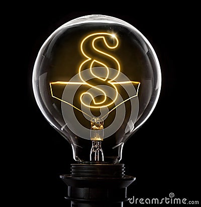 Lightbulb with a glowing wire in the shape of a paragraph symbol Stock Photo