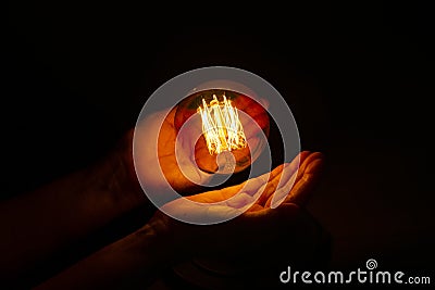 Lightbulb on hand ,abstract enegy magic concept Stock Photo