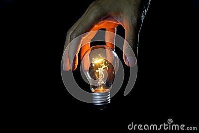 Lightbulb on black background,enegy concept Stock Photo