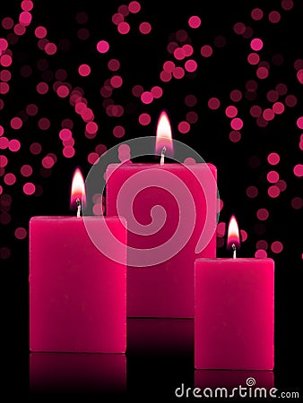 Lighted Christmas Candles Stock Photo