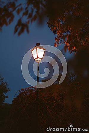 Lighted lantern on a dark blue sky Stock Photo
