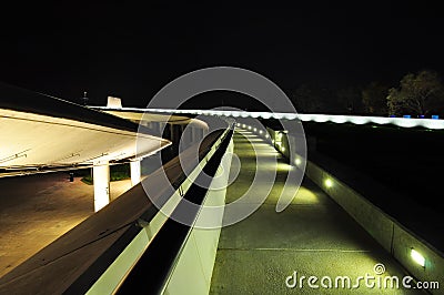 Lighted path at night Stock Photo
