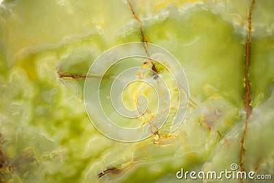 Lightened slices marble onyx. Horizontal image. Warm green colors. Beautiful close up background Stock Photo