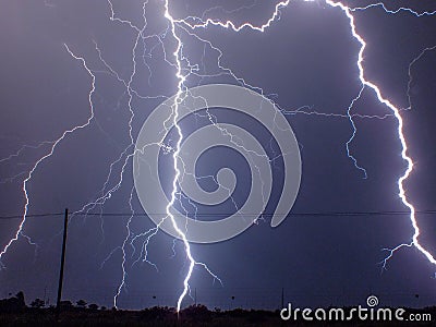 Lightening strikes in night sky Stock Photo