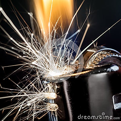 Lighter Igniting Sparks Stock Photo