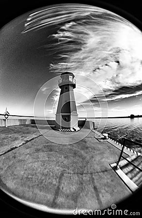 Lighthouse. Artistic look in black and white. Fisheye view. Stock Photo
