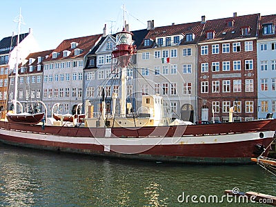 Lighthouse boat in Copenhagen's water canals Stock Photo