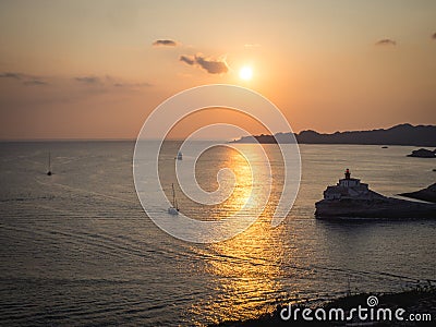 Lighthouse in Bonifacio at sunset Stock Photo