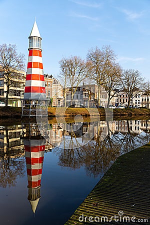 Lighthouse in Breda, reflection in the river Stock Photo