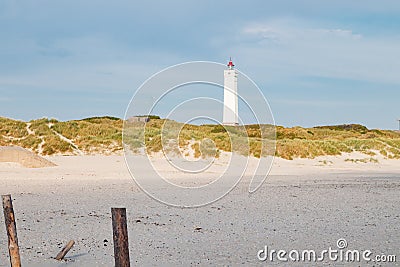 Lighthouse and bunker in the sand dunes on the beach of Blavand, Jutland Denmark Europe Stock Photo
