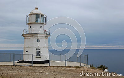 Lighthouse at cape Meganom. Stock Photo