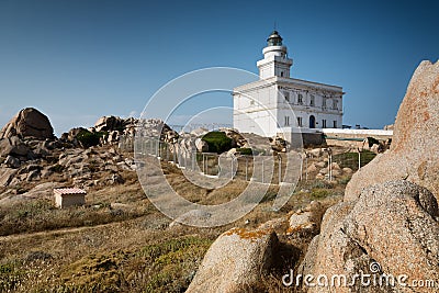 Lighthouse at the Capo Testa, Sardinia, Italy Stock Photo