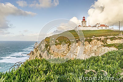 Lighthouse on the cliffs on Cape Roca, Sintra - Cascais Natural Stock Photo