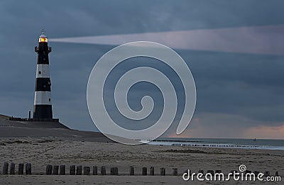 Lighthouse in the dusk Stock Photo