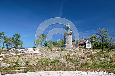 Lighthouse Hammeren Fyr on Bornholm Stock Photo