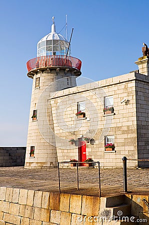 Lighthouse at Howth harbor in Ireland Stock Photo