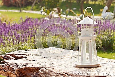 Lighthouse lamp in lavender garden Stock Photo