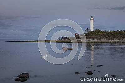 Lighthouse Lange Erik in the north of the island of Öland in the east of Sweden during sunset Stock Photo