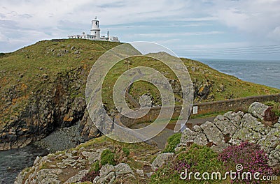 Lighthouse on the Pembrokeshire Coast, St Davids Bay. Stock Photo