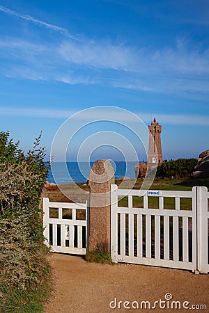 Lighthouse on the pink Granite Coast, Ploumanach, France Editorial Stock Photo