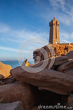 Lighthouse on the pink Granite Coast, Ploumanach, France Editorial Stock Photo