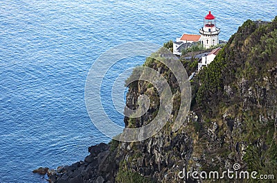 Lighthouse on Ponta do Arnel, Nordeste, Sao Miguel Island, Azores Islands, Portugal. Stock Photo